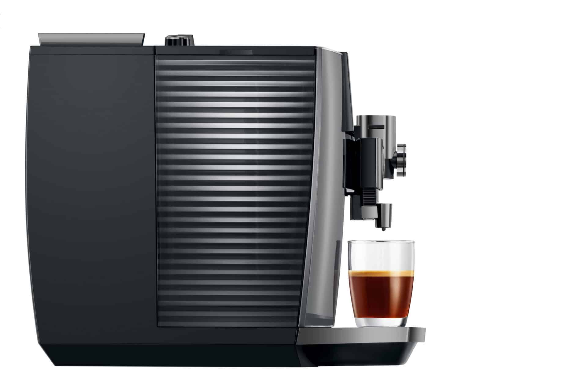 Koffiemachine met vers gezette espresso in een glas, perfect voor koffie liefhebbers.