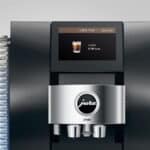 Verslatte espresso machine van Jura met digitale display en uniforme design voor de horeca of kantoorgebruik.