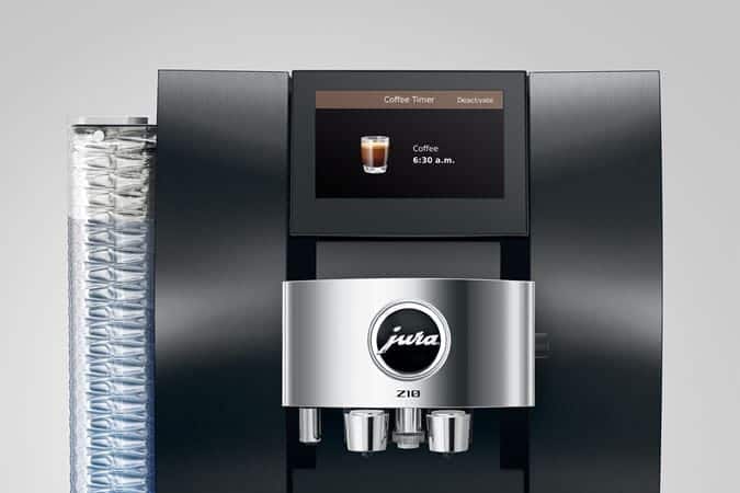 Verslatte espresso machine van Jura met digitale display en uniforme design voor de horeca of kantoorgebruik.